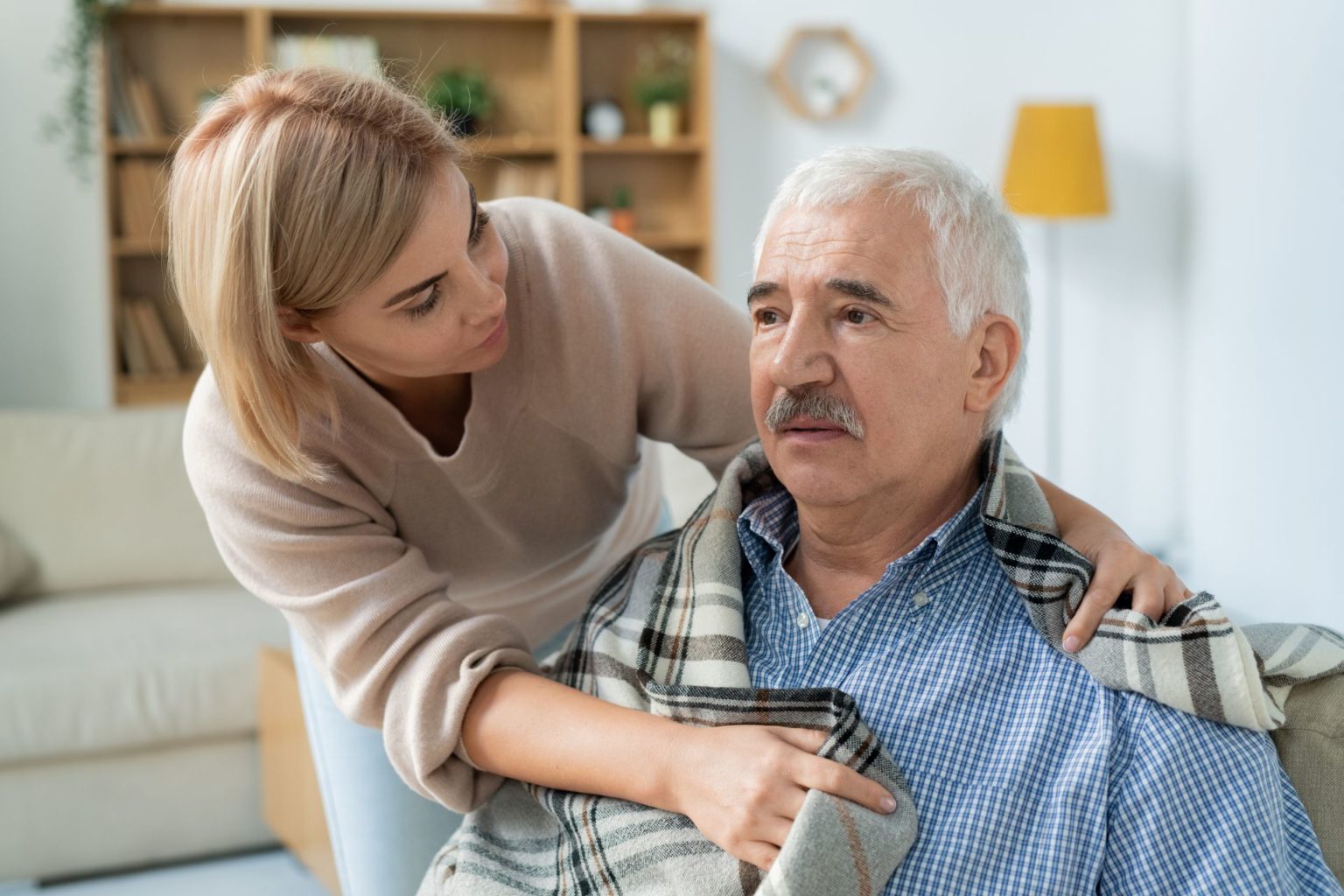 Caregiver assisting a senior