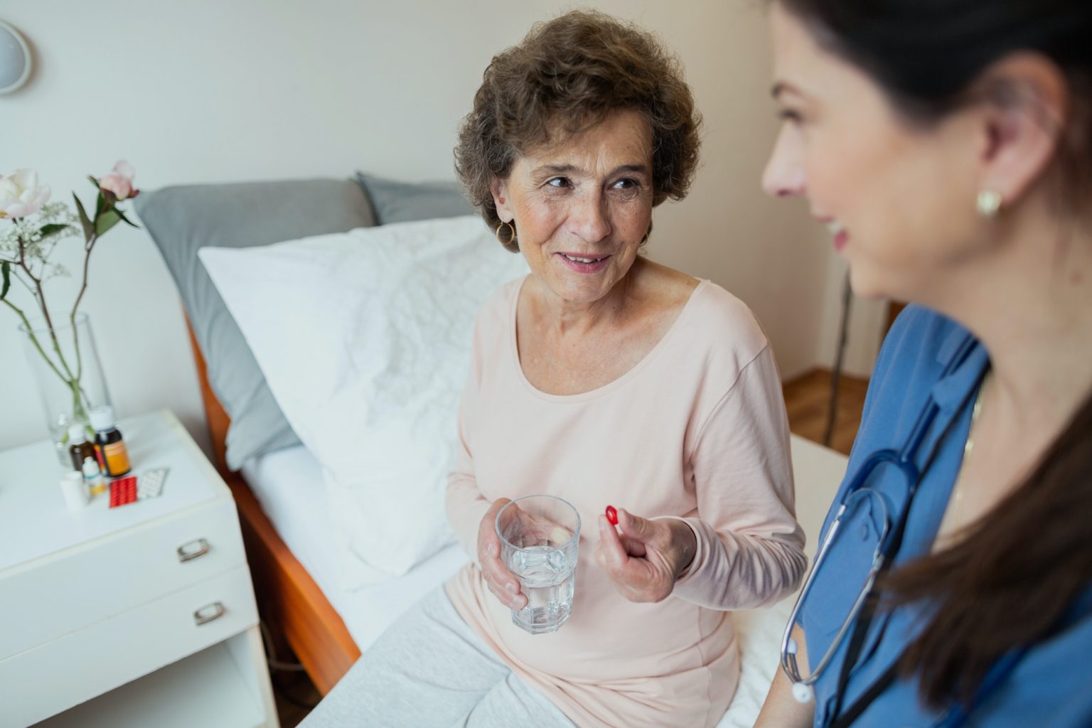 Caregiver assisting a senior resident